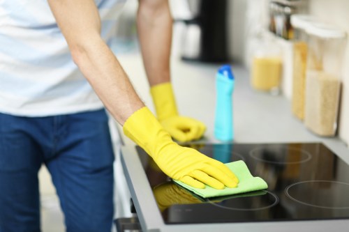 Deep cleaning equipment being used on a sofa in Hackney